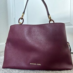 Medium sized Burgundy/Maroon Michael Kors purse
